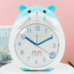 Front view of a Kawaii Cute Hamster Clock & Night Light in blue and white 