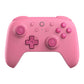Pink gaming controller on a white background