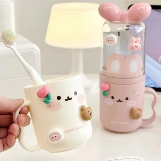 Kawaii toothbrush container with animal designs on a light surface.