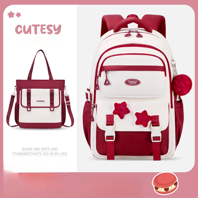 Red and white backpack with star designs on a pink background, featuring the brand 'Cutesy'.
