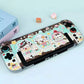 Nintendo Switch case with cartkawaiion designs on a light blue background