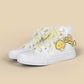 A pair of white high-top canvas sneakers with pale yellow laces and a yellow duck character patch on the side, set against a solid beige background.