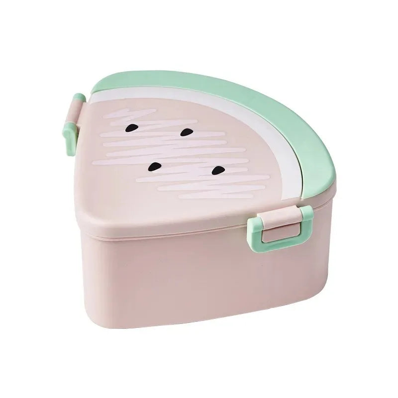 Pink and green watermelon-shaped bento box on a white background