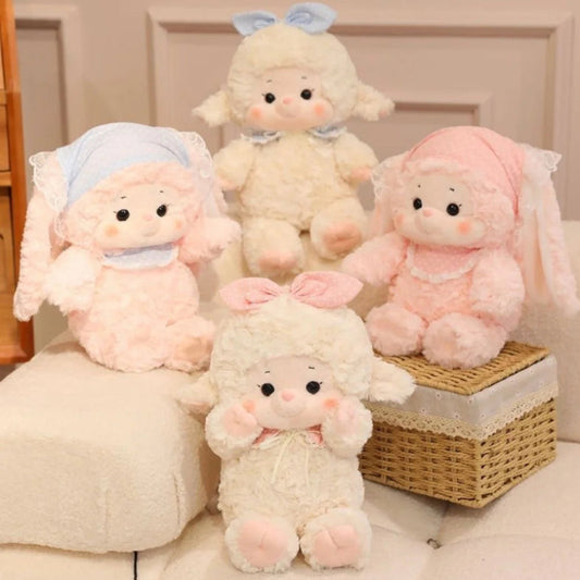 Pastel Kawaii Bunny and Lamb Plushies sitting on a couch 