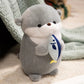 Adorable Kawaii Grey Otter Plushie holding fish 