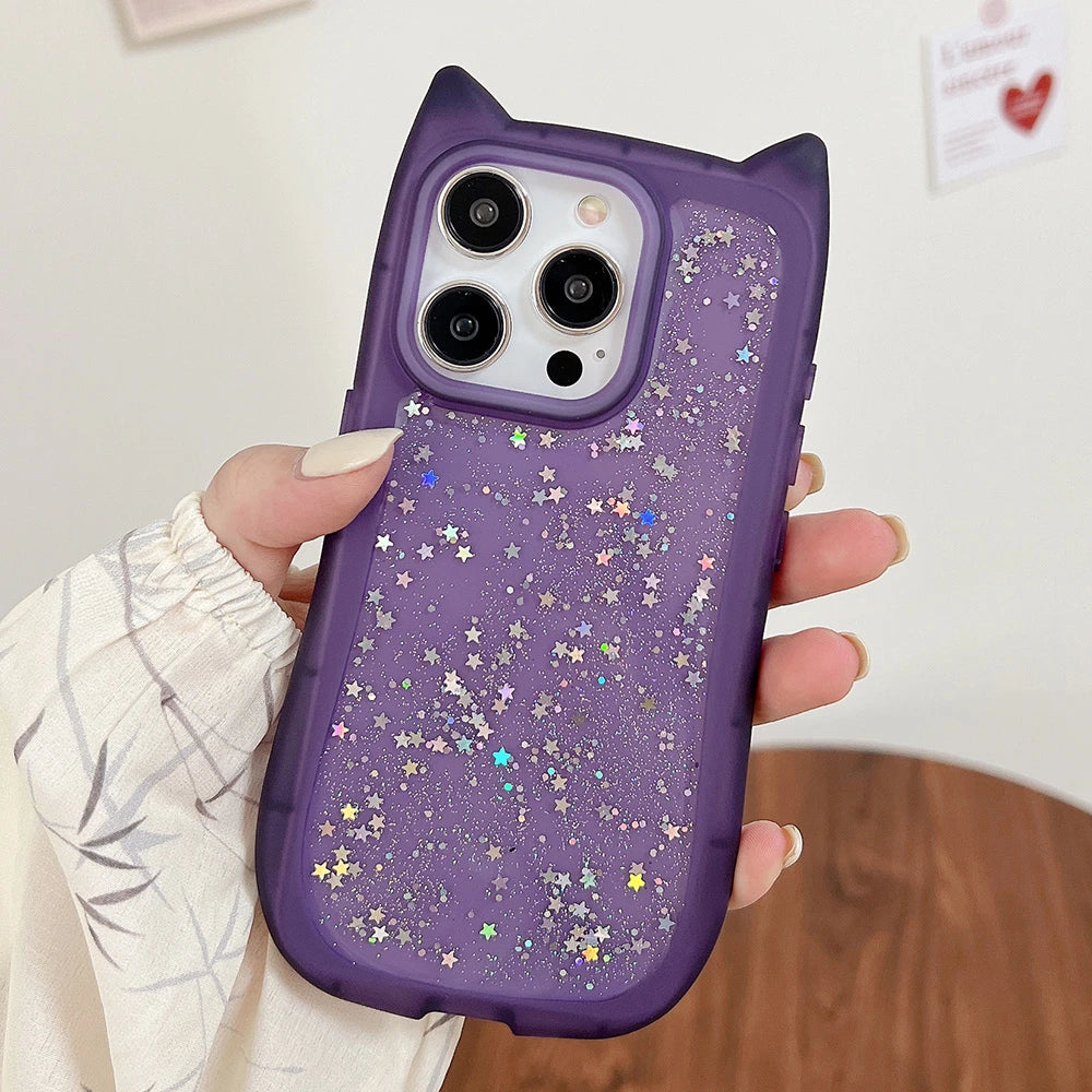 Purple phone case with star glitter held by a person indoors.
