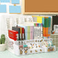 White desk organizer with stationery items on a desk