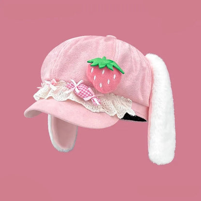 Pink kawaii bunny hat with strawberry design on a pink background