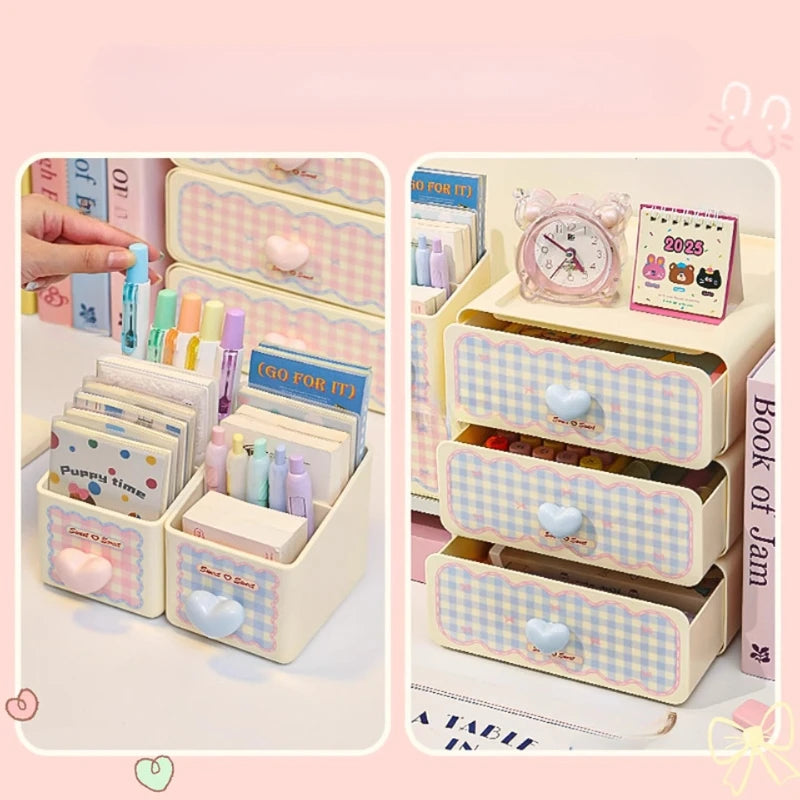 Desk organizer with stationery items and a small clock on a pink background