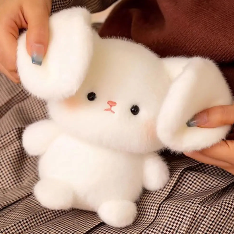 Kawaii Cutie Club Rabbit being held by a woman