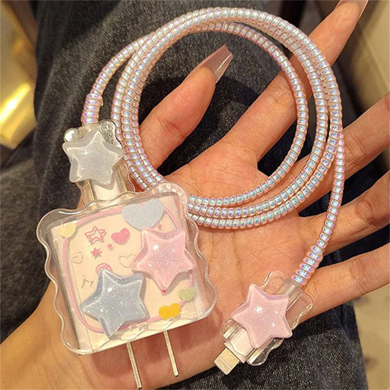 iPhone charger cover with star design held by a hand
