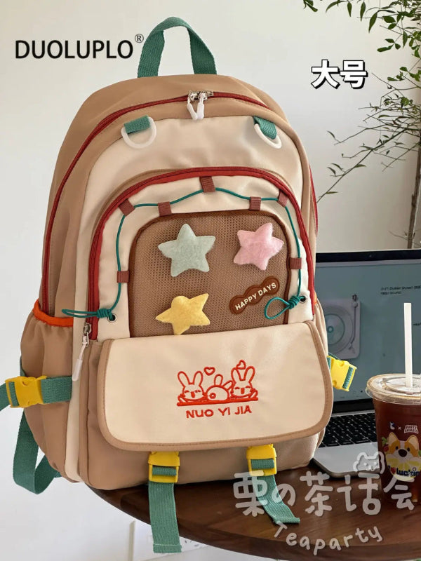 Kawaii  backpack with colorful design on a white surface