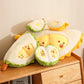 Plush toys shaped like durian on a wooden surface with a neutral background
