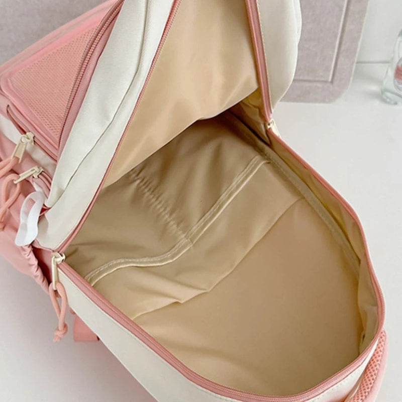Pink neko backpack displaying inside of bag