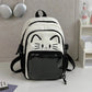 balck neko backpack displayed by a white wall