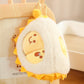 Plush durian keychain on a blurred background