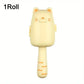 Cat-shaped lint roller on a white background