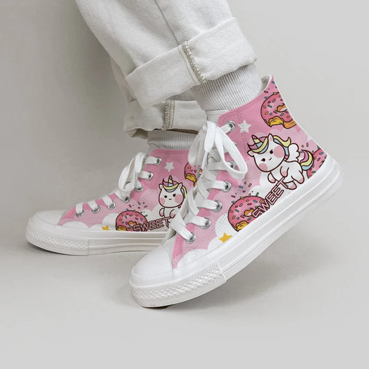 Kawaii Pink and White Unicorn Canvas Sneakers shown with a woman modeling them 