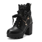 Black lace-up boot with bow and star charm on a white background