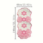 Pink and white floral bath mat with dimension markings showing 140cm in height and 60cm in width on a plain white background.