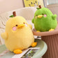 Front view of Kawaii  Cute Duck Peak Plushies in green and yellow on a sitting area  