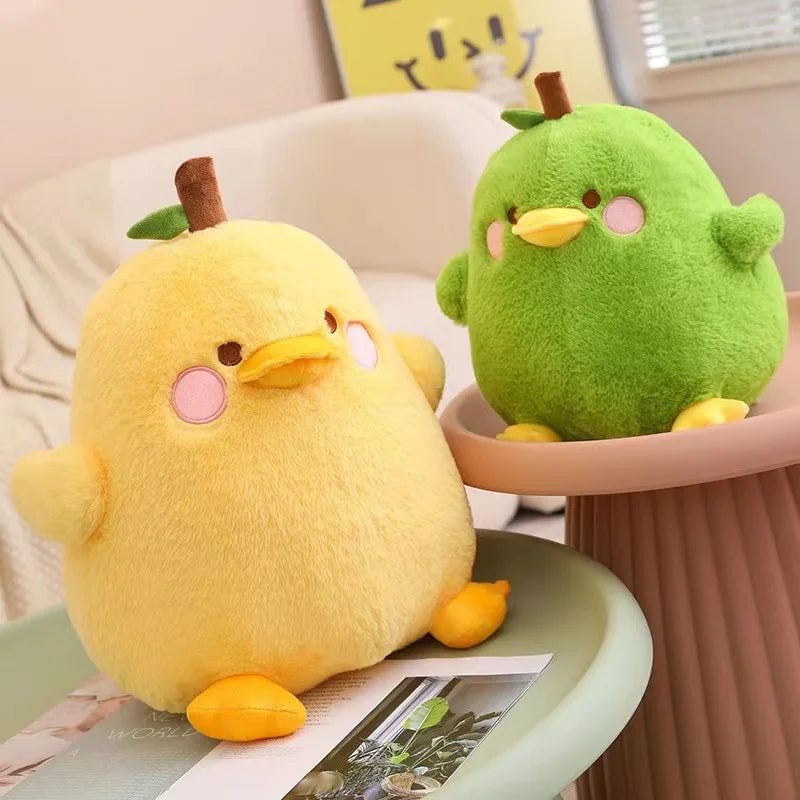 Front view of Kawaii  Cute Duck Peak Plushies in green and yellow on a sitting area  