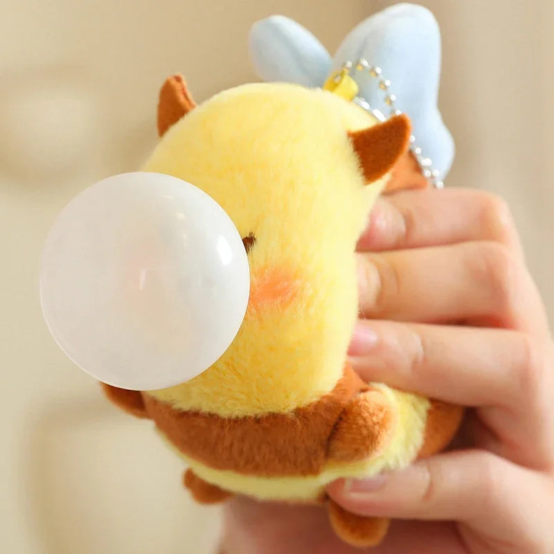 woman squishing kawaii bee plushie