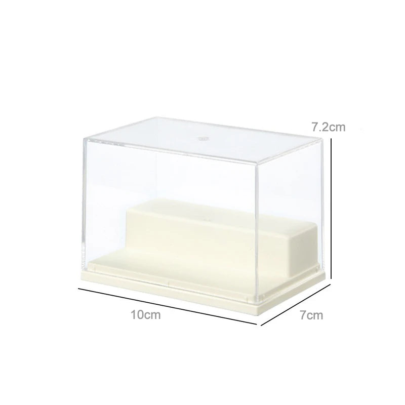A clear acrylic display case with a cream-colored interior shelf, shown with dimension labels indicating 10cm width, 7cm depth, and 7.2cm height on a white background.