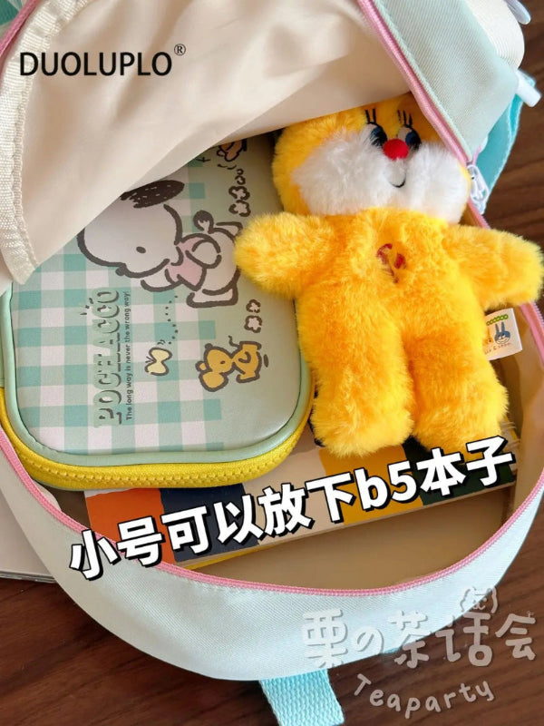 Kawaii Pastel-colored backpack with star designs, this is displayed open so you can see the storage 