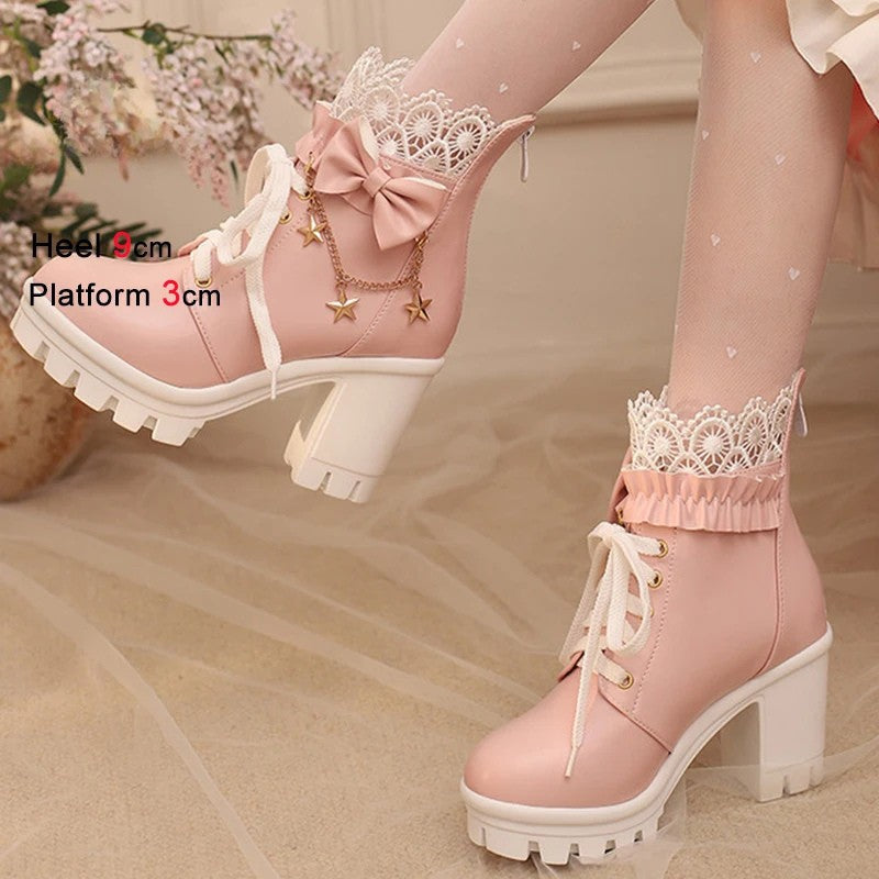 Pink platform shoes with bow and star decorations on a neutral background