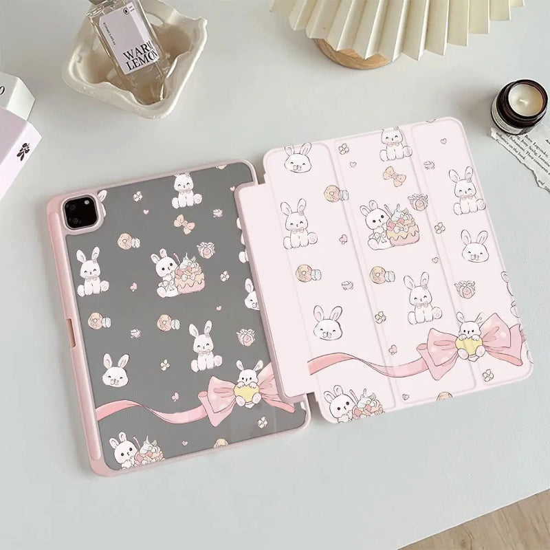 tablet case with cute rabbit and bow pattern on a light surface.