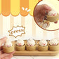 Set of cute keychains shaped like cartoon-style buns in a wooden steamer with a 'press' label.