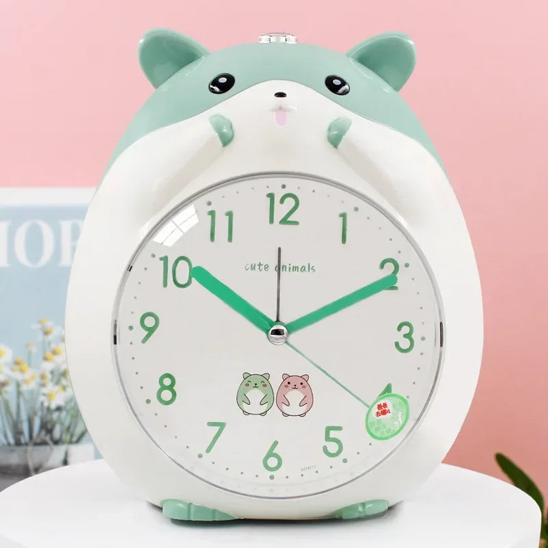 Cute animal-shaped clock with green and white design on a pink background