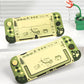 Two green handheld gaming devices with drawing screens on a white surface.