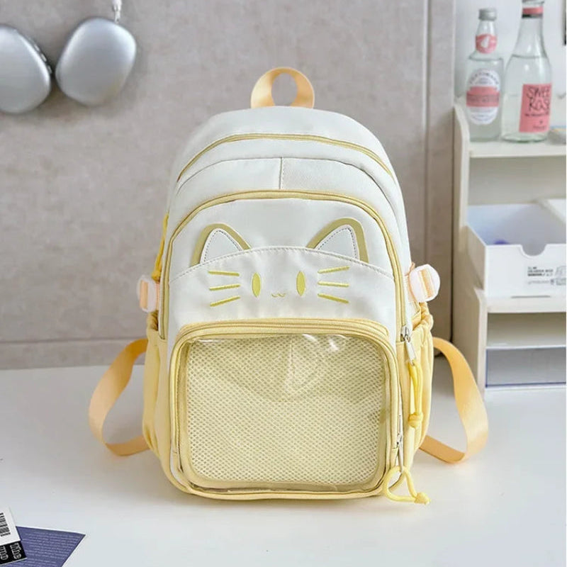 Pink neko backpack displayed by a white wall