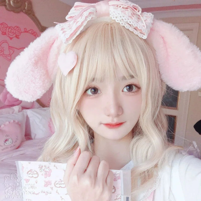 woman modelling the pink Kawaii Bunny Ears Headband