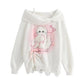 Kawaii white hoodie with a cat graphic and text on a white background