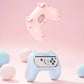 Pink and blue gaming controllers with animal-like design on a pink background