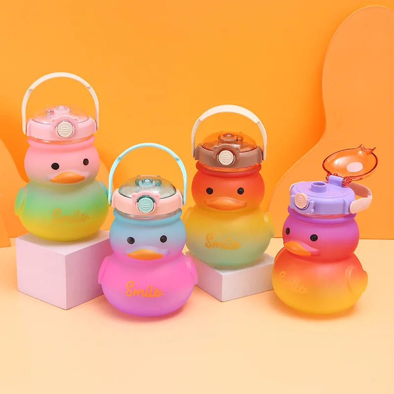 Set of colorful duck-shaped water bottles with gradient colors on an orange background