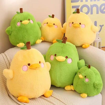 Front view of Kawaii  Cute Duck Peak Plushies in green and yellow on a sitting area  