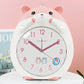 Front view of a Kawaii Cute Hamster Clock & Night Light in pink and white 