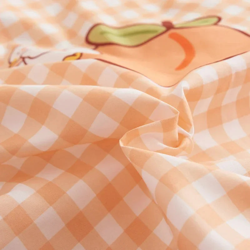 cute checkered fabric with a cartoon ducky on an orange background