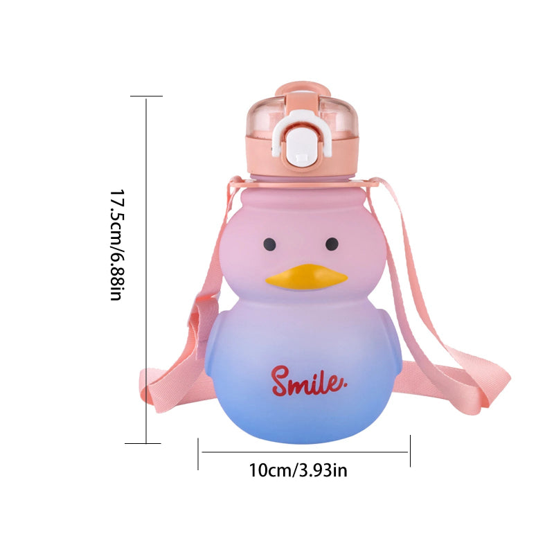 Pink and blue duck-shaped water bottle with a strap, measurements indicated on the left.