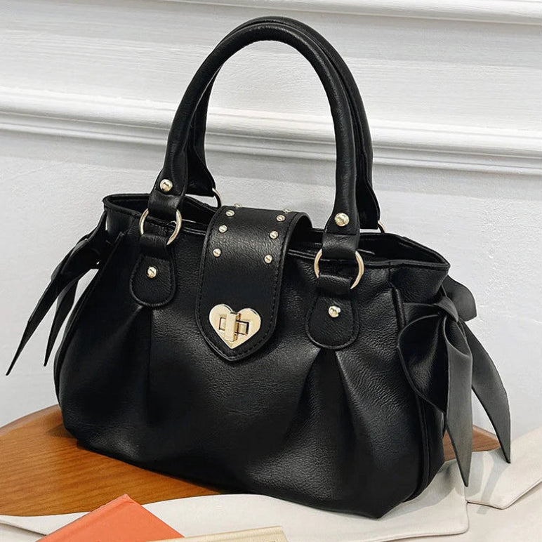 Kawaii Sweet Heart Lock Bag in black on a table 