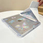 Clear case with butterfly designs on a white surface