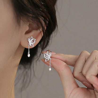 Kawaii Silver Butterfly Stud Earrings worn by a woman 