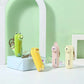 Four small animal-themed fans on a light green background