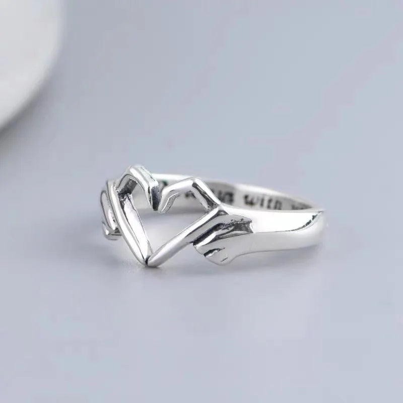 Heart Hand Ring in Silver Tone