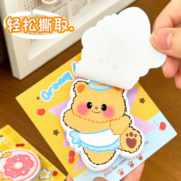 Hand peeling a sticky note page