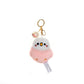 kawaii pink and white bird plushie keychain on a white background